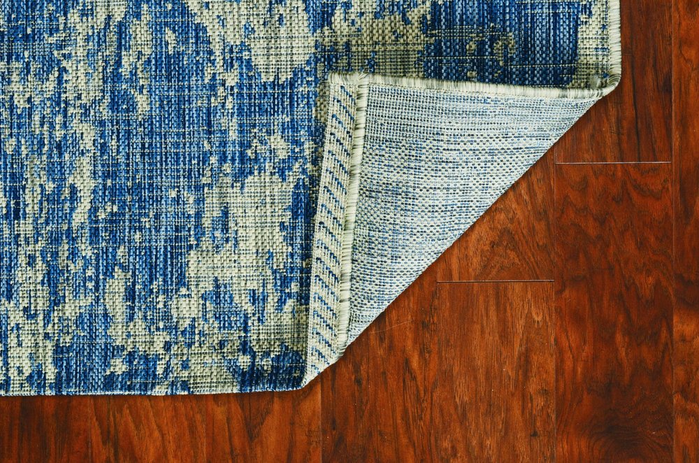 5' X 8' Blue And Green Abstract Indoor Outdoor Area Rug