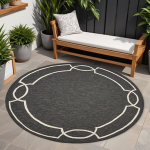 7' Onyx And Ivory Round Geometric Handmade Indoor Outdoor Area Rug