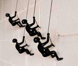 Set of Four Black Resin Climbing Man Hanging Dimensional Sculpture