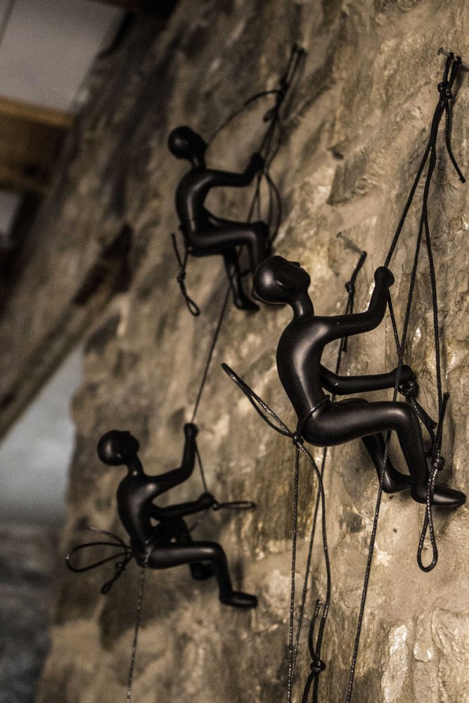 Set of Four Black Resin Climbing Man Hanging Dimensional Sculpture