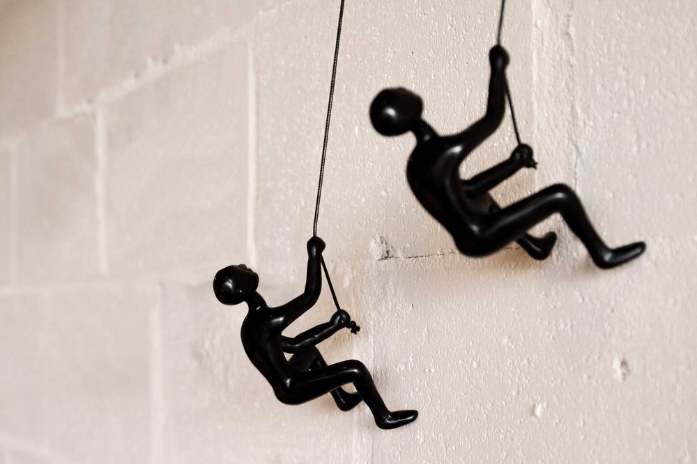 Set of Two Black Resin Climbing Man Hanging Dimensional Sculpture