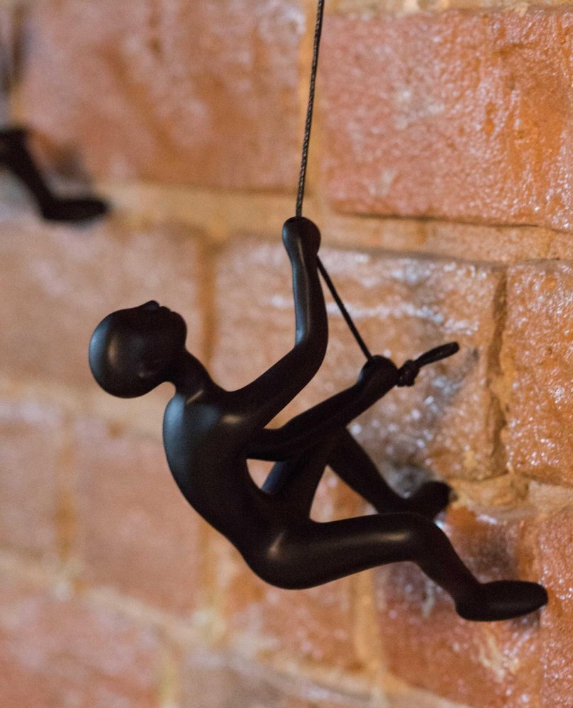 Set of Two Black Resin Climbing Man Hanging Dimensional Sculpture