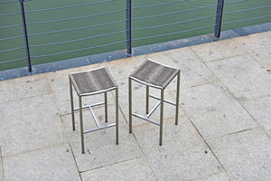 Set of Four 28" Brown And Silver Iron And Steel Backless Counter Height Bar Chairs