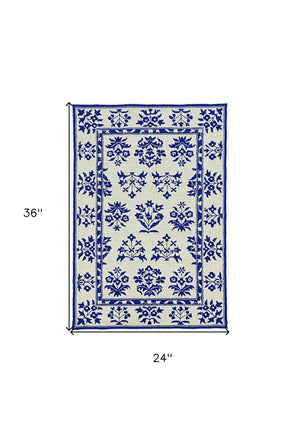 5' X 7' Sand Or Blue Floral Bordered Indoor Outdoor Area Rug