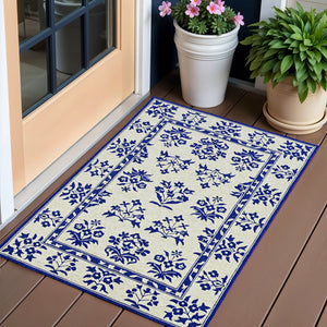 5' X 7' Sand Or Blue Floral Bordered Indoor Outdoor Area Rug