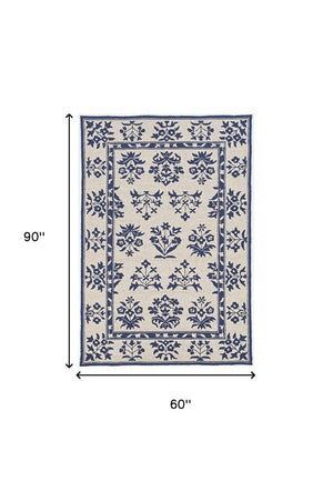 5' X 7' Sand Or Blue Floral Bordered Indoor Outdoor Area Rug