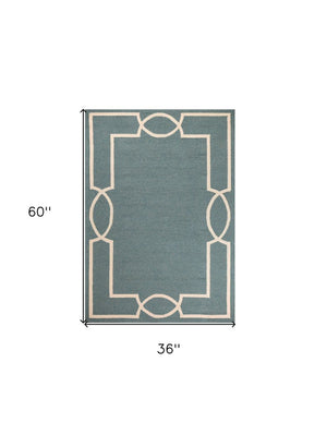 5' X 7' Gray And Ivory Handmade Indoor Outdoor Area Rug
