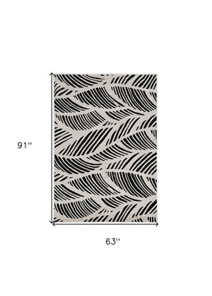 2' X 4' Black And White Abstract Indoor Outdoor Area Rug