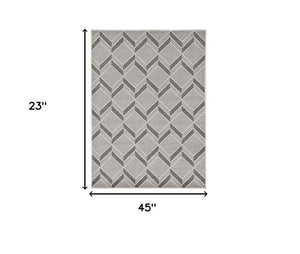 2' X 4' Green And Ivory Geometric Indoor Outdoor Area Rug