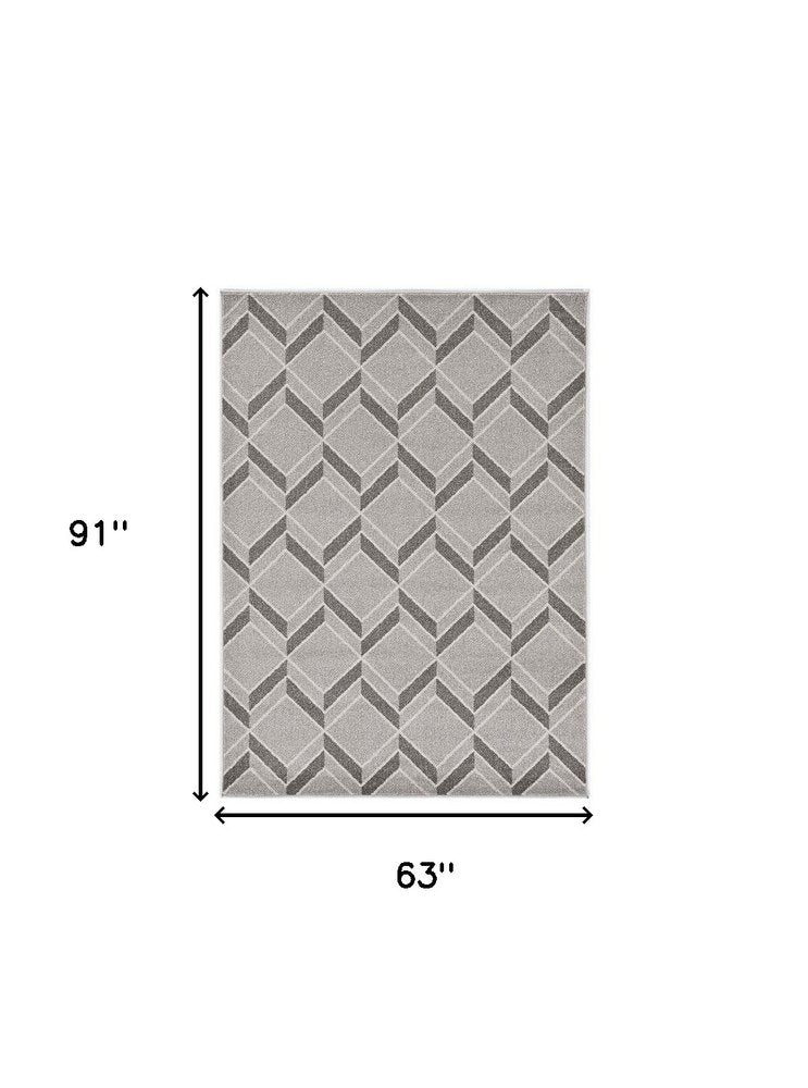 2' X 4' Green And Ivory Geometric Indoor Outdoor Area Rug