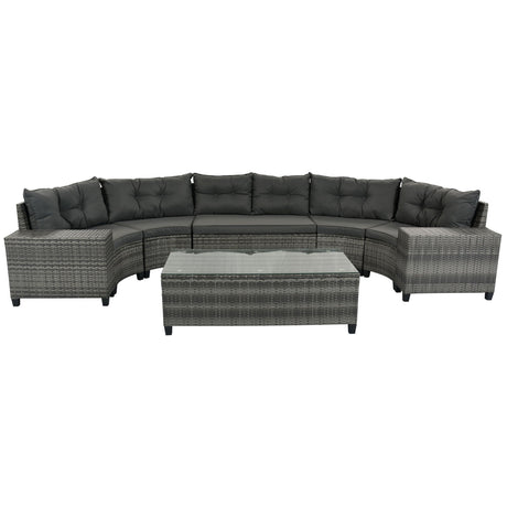 The 8 Pieces Outdoor Wicker Round Sofa Set features a half-moon sectional with gray wicker and dark cushions, including a curved sofa and a rectangular glass-top coffee table. This all-weather PE rattan set offers ample seating and serving space, ideal for patios or gardens.