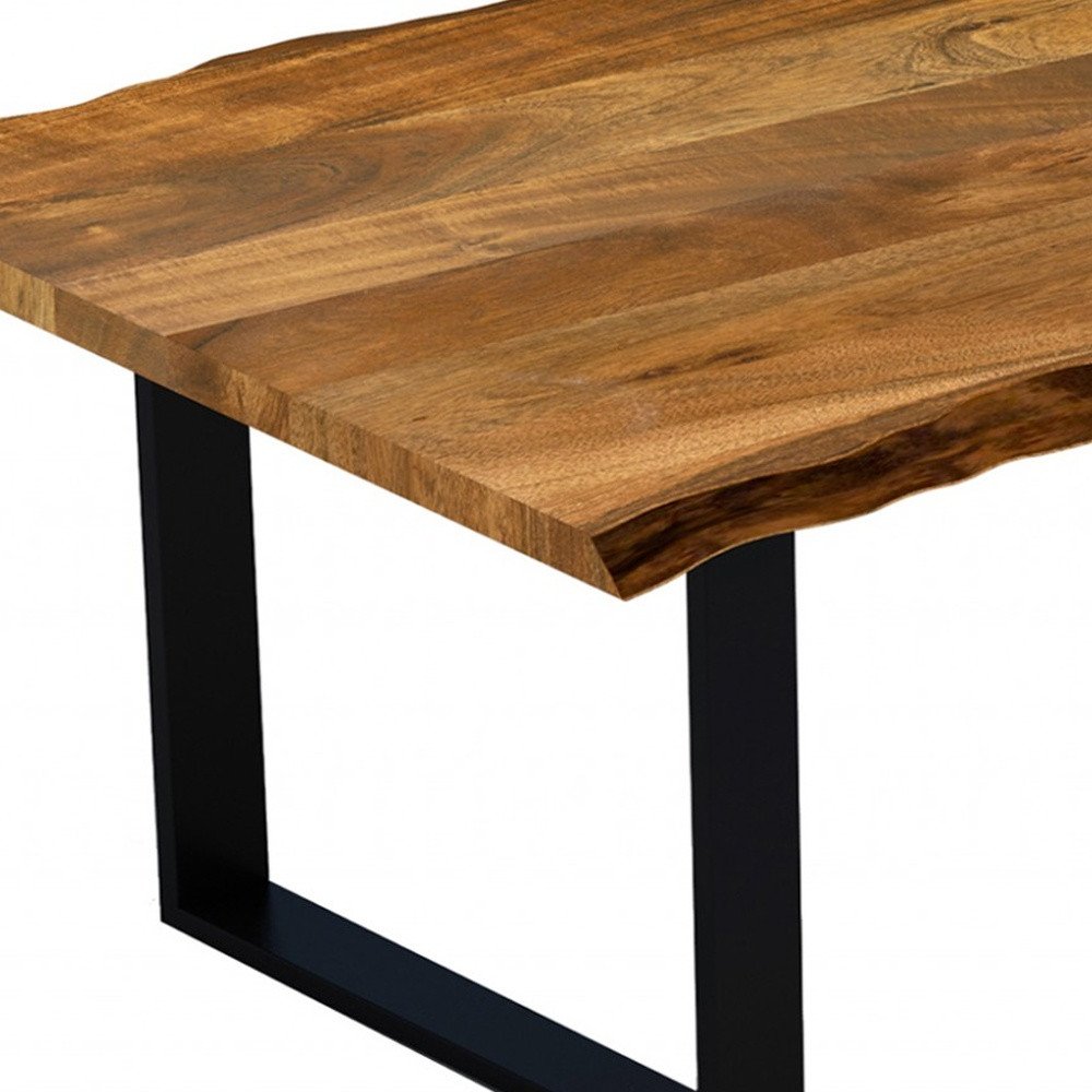 63" Brown And Black Solid Wood Sled Base Dining Table