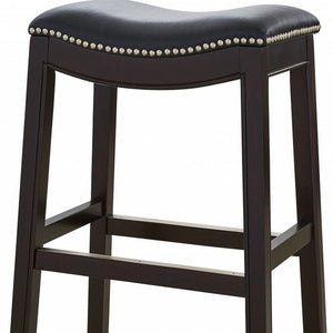31" Black And Espresso Faux Leather And Solid Wood Backless Bar Height Bar Chair