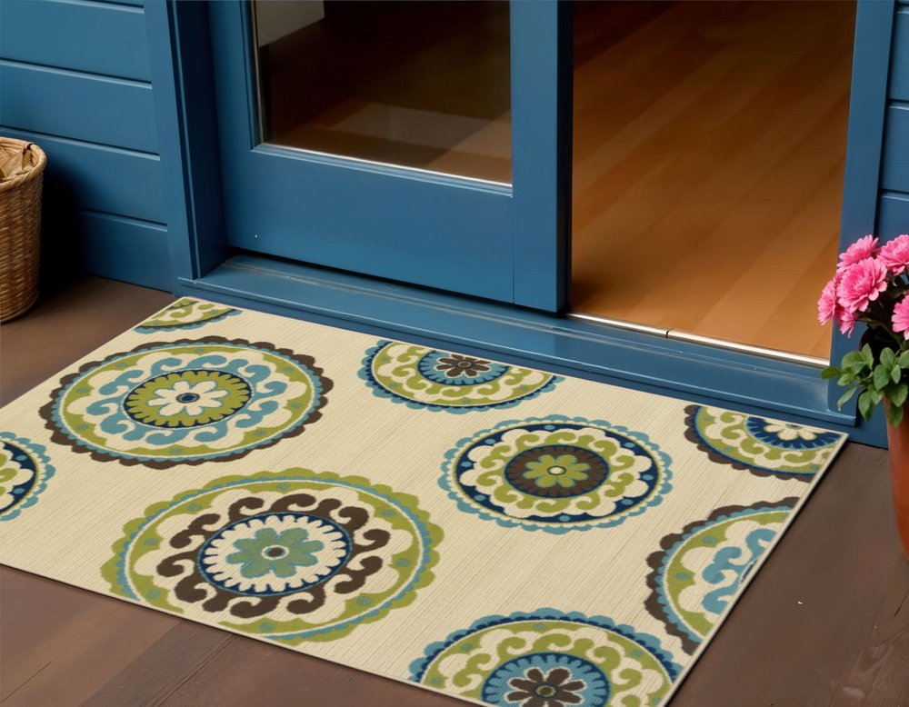 8' X 13' Ivory Indigo And Lime Green Floral Medallion Indoor Outdoor Area Rug