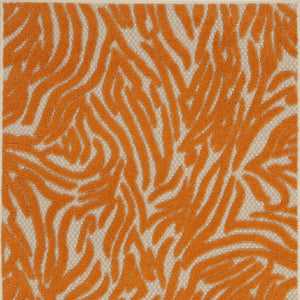 4' X 6' Orange And Ivory Abstract Stain Resistant Indoor Outdoor Area Rug