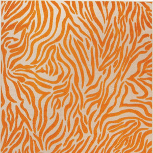 4' X 6' Orange And Ivory Abstract Stain Resistant Indoor Outdoor Area Rug
