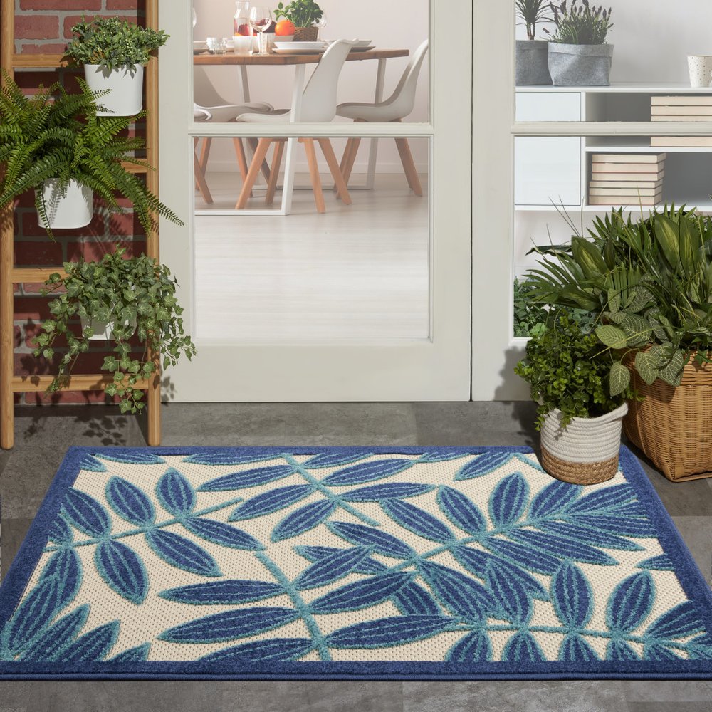 6' X 9' Blue And Ivory Floral Indoor Outdoor Area Rug