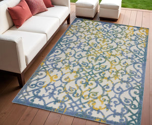 5' X 8' Ivory And Blue Indoor Outdoor Area Rug