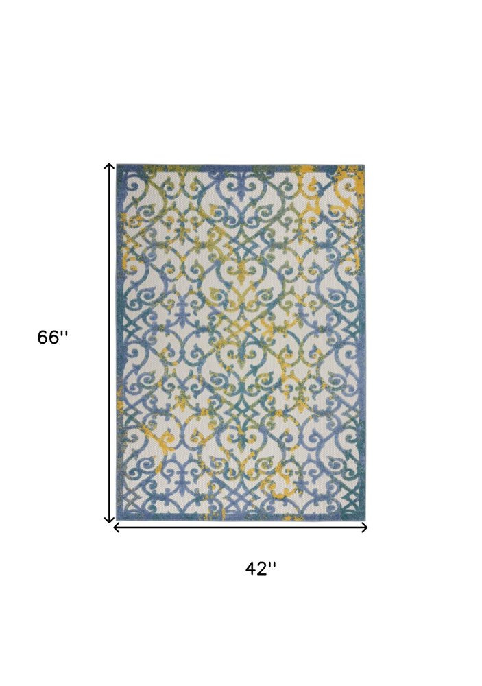 6' X 9' Ivory And Blue Indoor Outdoor Area Rug