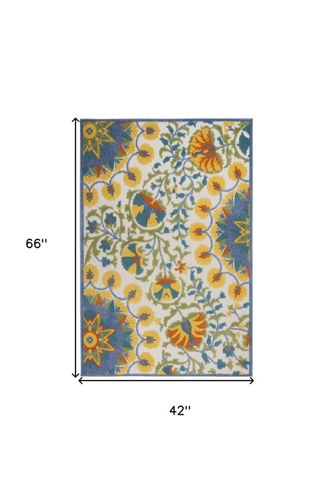 8' X 11' Ivory And Blue Floral Indoor Outdoor Area Rug