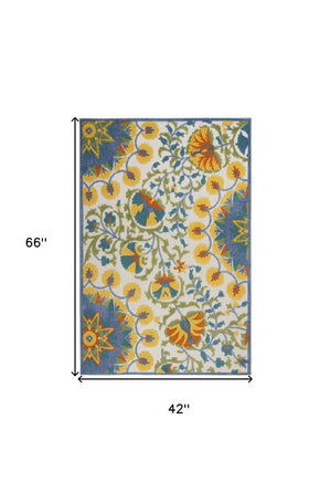 8' X 11' Ivory And Blue Floral Indoor Outdoor Area Rug
