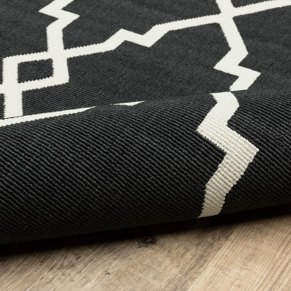 8' X 11' Black And Ivory Indoor Outdoor Area Rug