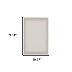 7' X 9' Gray And Ivory Indoor Outdoor Area Rug