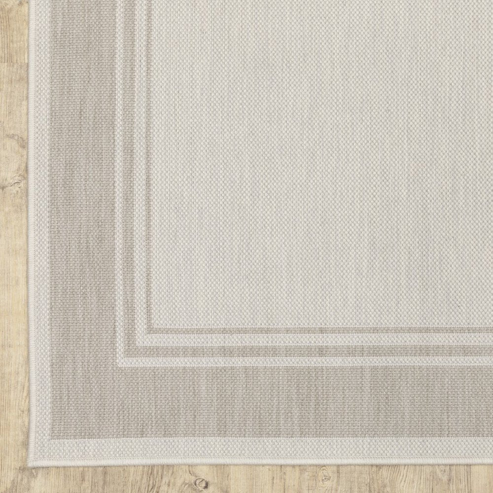 7' X 9' Gray And Ivory Indoor Outdoor Area Rug