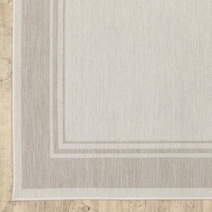 7' X 9' Gray And Ivory Indoor Outdoor Area Rug