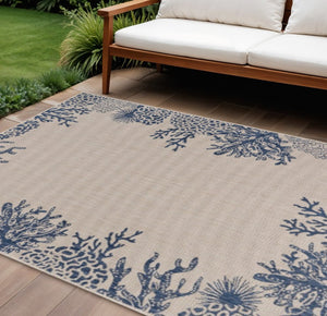 8' X 9' Beige And Blue Coral Indoor Outdoor Area Rug