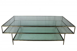 54" Clear and Brass Glass and Iron Coffee Table