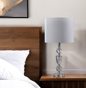 24" Clear And Silver Faux Crystal And Metal Table Lamp With White Drum Shade