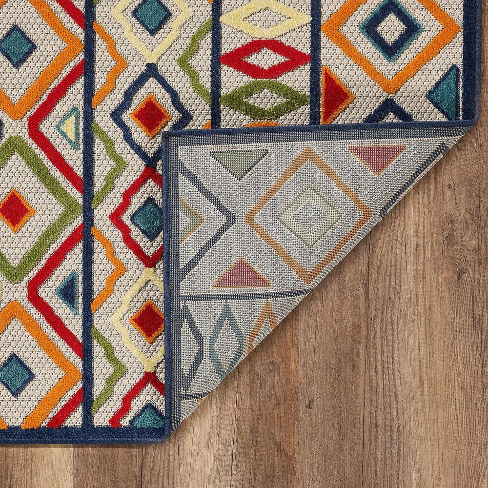 5' X 7' Ivory And Blue Southwestern Stain Resistant Indoor Outdoor Area Rug