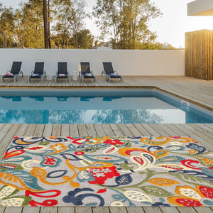 7' X 9' Ivory And Blue Indoor Outdoor Area Rug