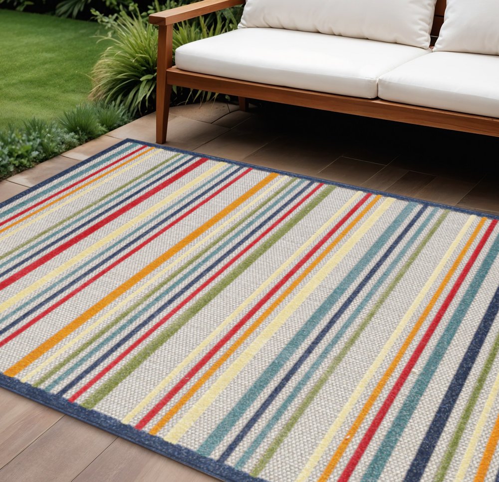 8' X 10' Ivory And Blue Striped Stain Resistant Indoor Outdoor Area Rug