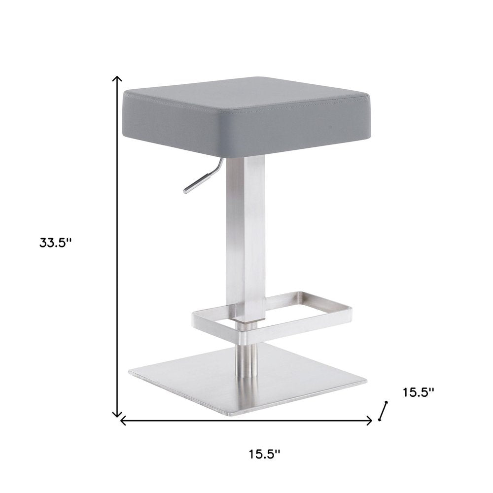 25" Gray And Silver Faux Leather And Iron Swivel Backless Adjustable Height Bar Chair