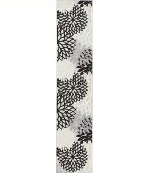 10' Black And White Indoor Outdoor Runner Rug