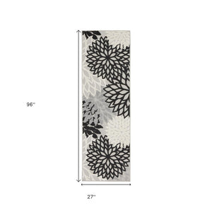 8' Black And White Indoor Outdoor Runner Rug