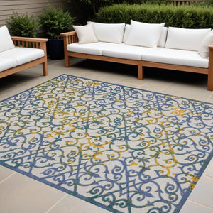 9' X 12' Ivory And Blue Indoor Outdoor Area Rug