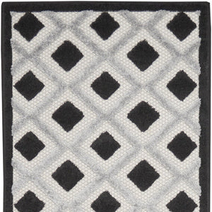 10' Black And White Indoor Outdoor Runner Rug