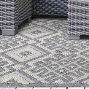 7' X 9' Cream Geometric Stain Resistant Non Skid Indoor Outdoor Area Rug