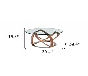 39" Clear and Brown Glass And Solid Wood Round Abstract Coffee Table