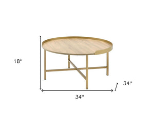 34" Oak and Gold Wood And Metal Round Sled Coffee Table
