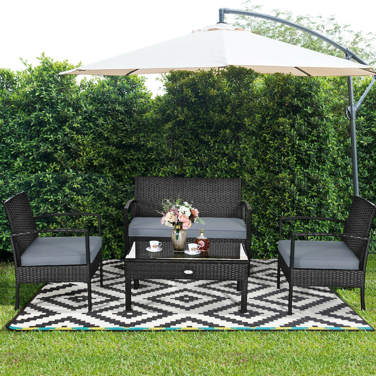 4 Pieces Patio Rattan Cushioned Furniture Set with Loveseat and Table -Brown