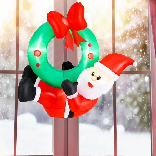 4 ft Inflatable Santa Claus Wreath with Red Bow and 5 LED Lights