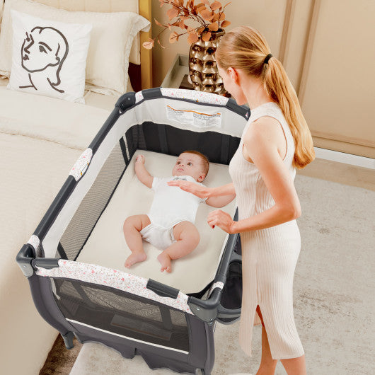 4 in 1 Portable Pack and Play Baby Nursery Center with Bassinet-Heart Pink