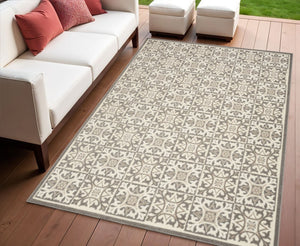 4' X 6' Ivory And Grey Fleur De Lis Stain Resistant Non Skid Area Rug
