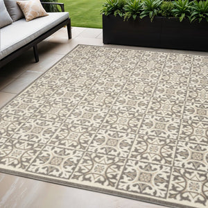 5' X 8' Ivory And Grey Fleur De Lis Stain Resistant Non Skid Area Rug