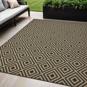 5' X 8' Black and Tan Geometric Stain Resistant Indoor Outdoor Area Rug