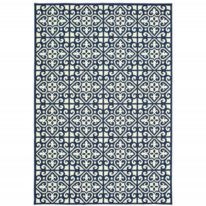 8' X 11' Ivory and Blue Geometric Stain Resistant Indoor Outdoor Area Rug